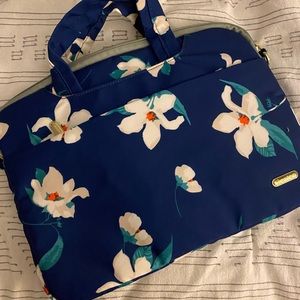 Floral laptop bag with crossbody attachment